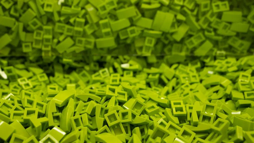 LEGO Bonsai Tree Set showing green foliage and pink cherry blossom versions side-by-side on neutral surface